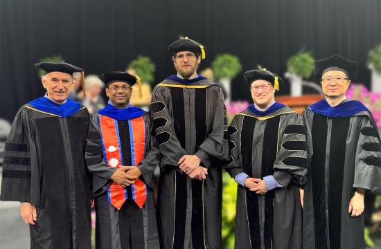 Physics and Astronomy PhD graduates Vishal Jayswal, Charles Mentzer, and Alec Martin